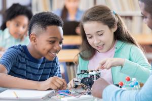 Two children in a science classroom